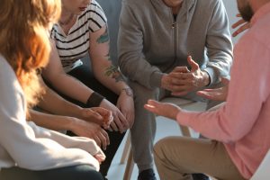 Group of young people having a discussion